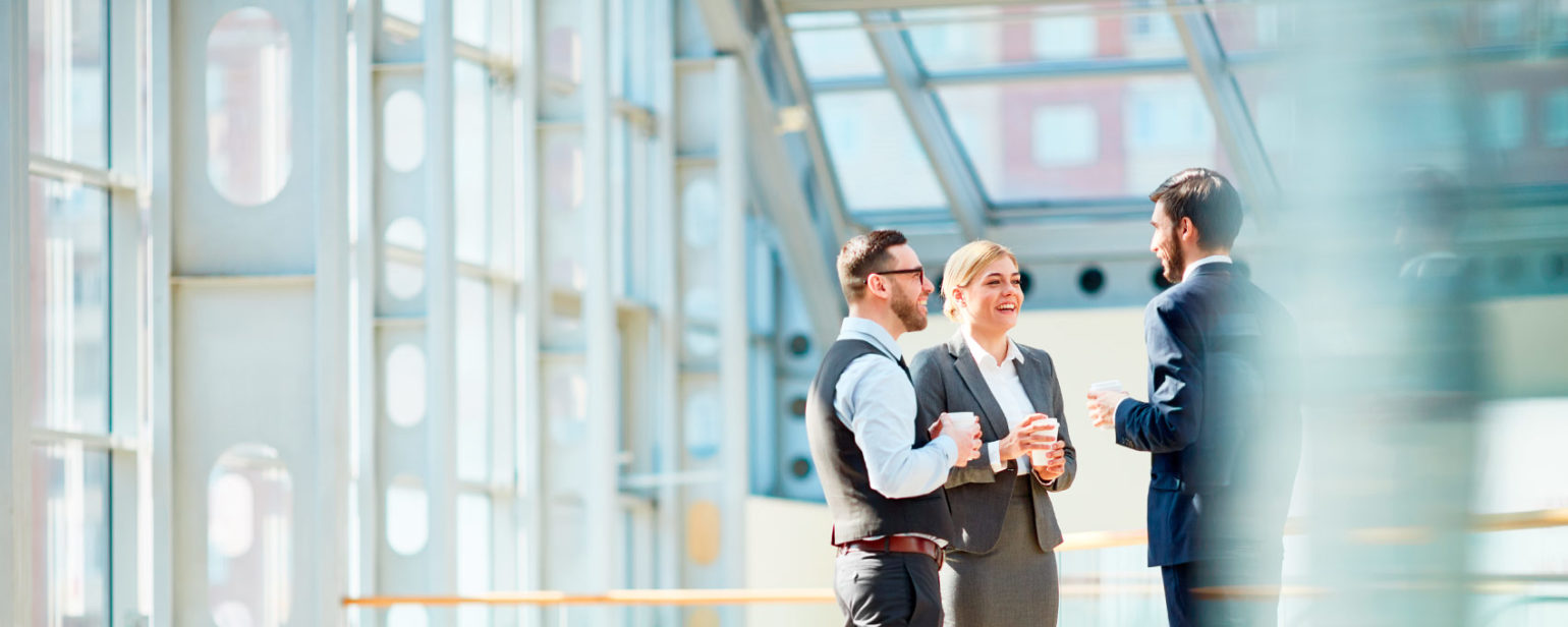 Image of Group of modern business people chatting