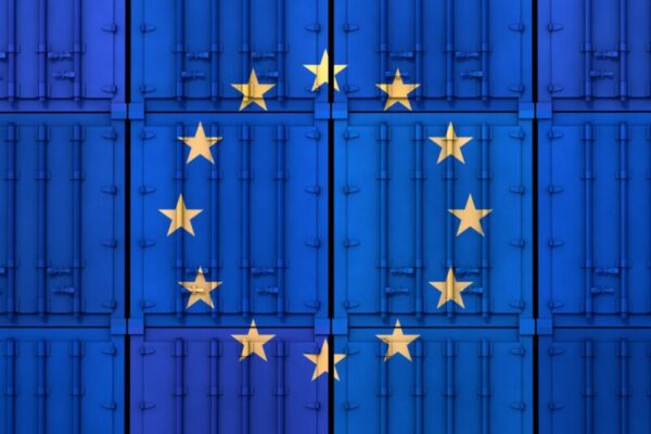 Flag Of Eu. Import Export Business. Stacked Cargo Containers. Th